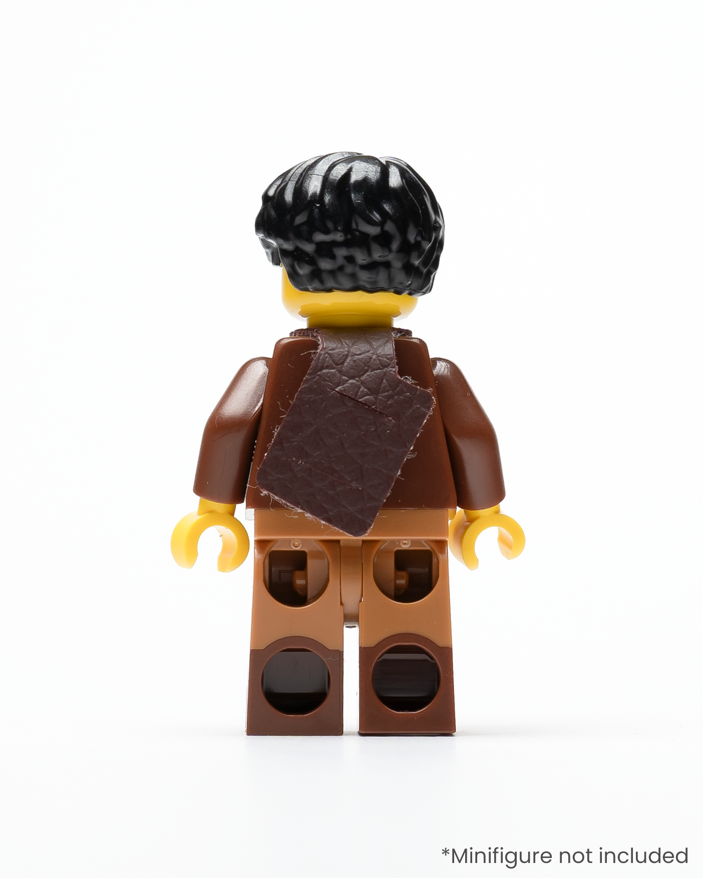 A rear view of a LEGO minifigure wearing a sheath on its back