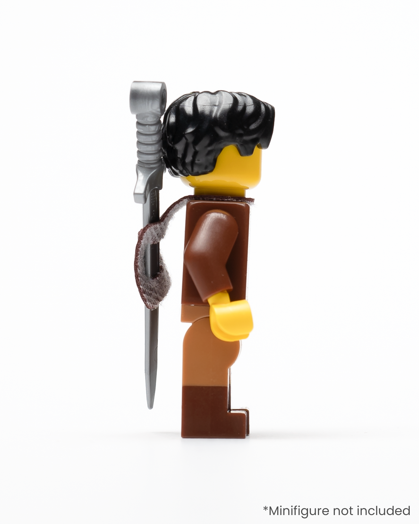 Profile of a LEGO minifigure wearing a sword in a sheath on its back