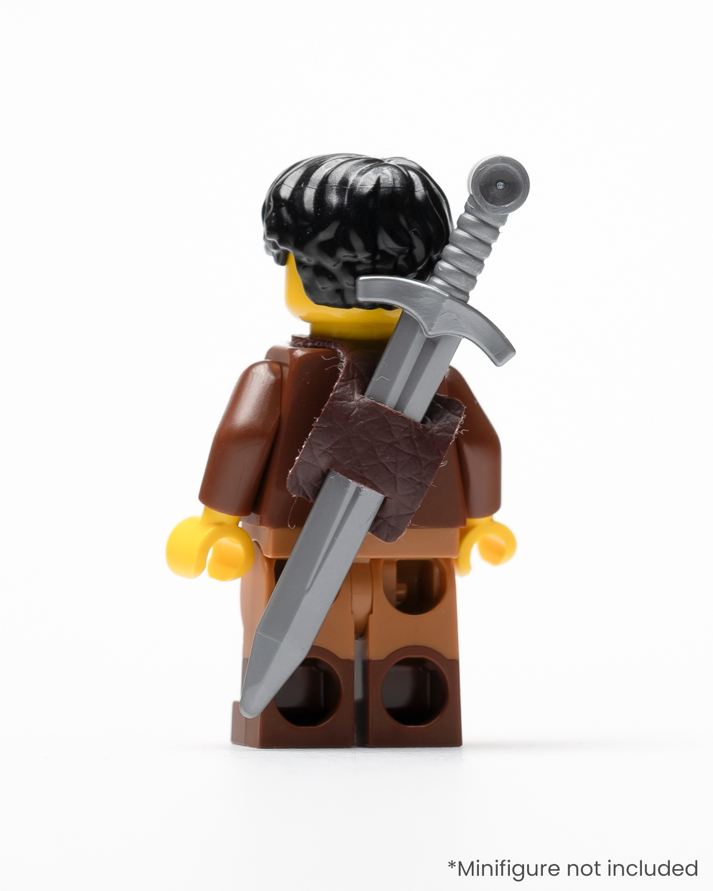 A rear view of a LEGO minifigure wearing a sword in a sheath on its back