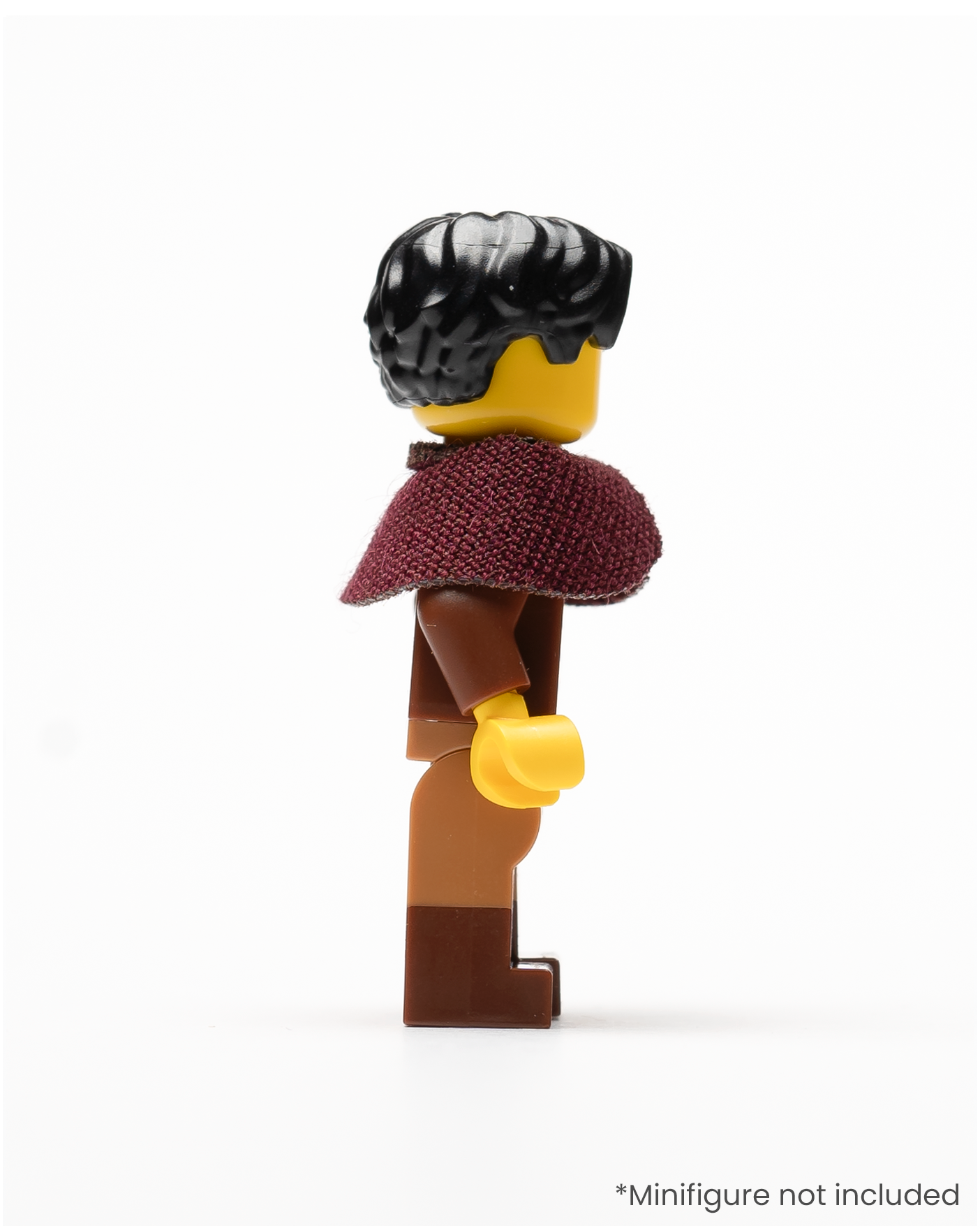 Profile of a LEGO minifigure wearing a dark red shoulder cape