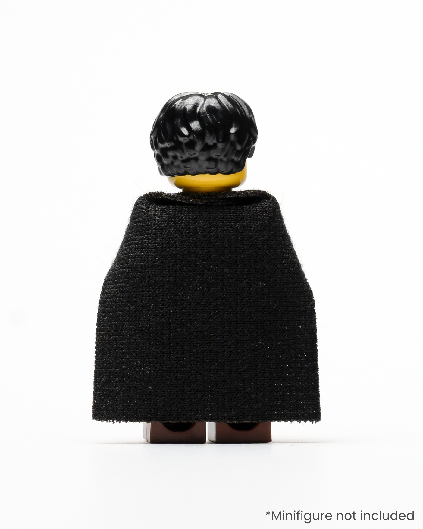 A rear view of a LEGO minifigure wearing a black cloak