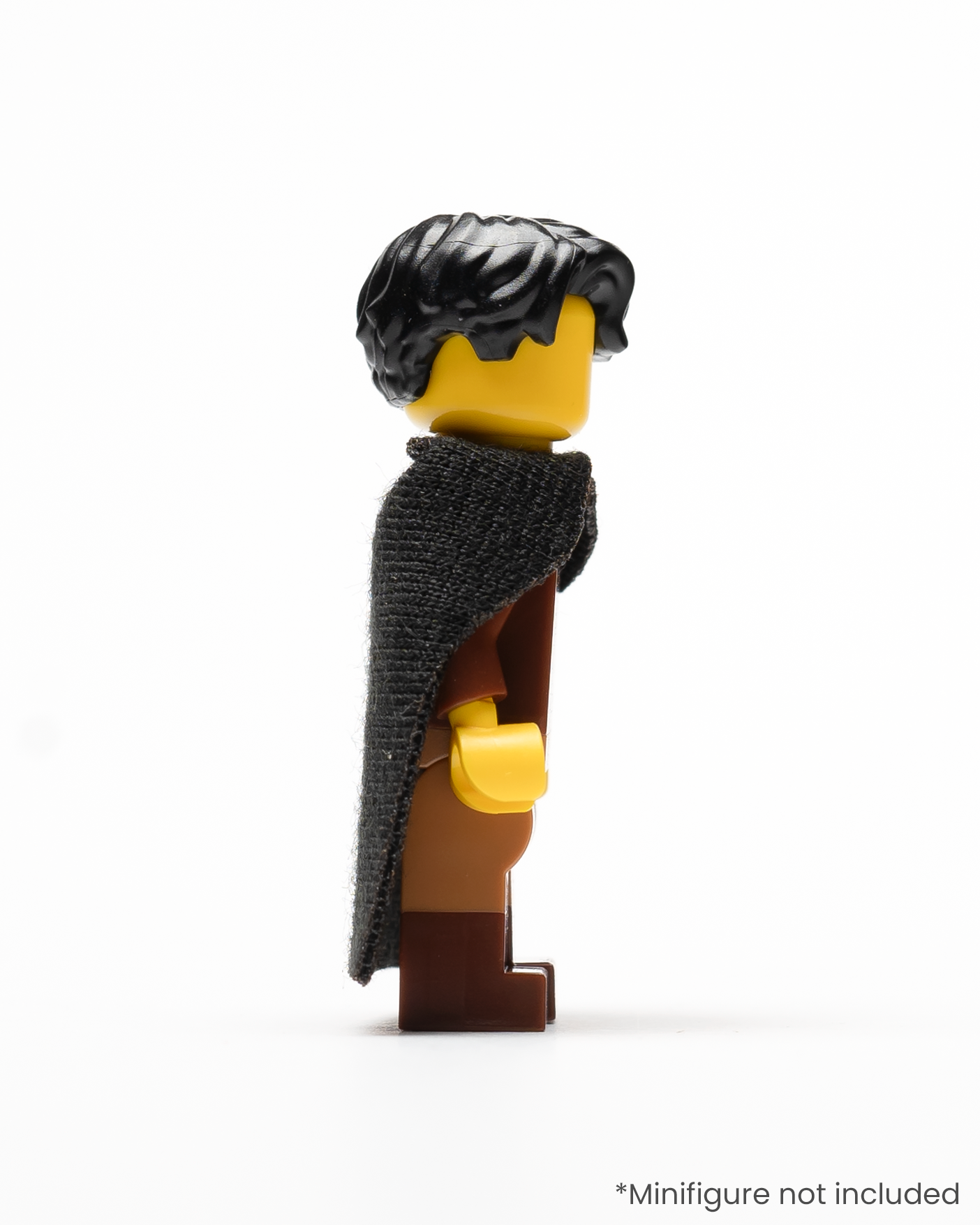Profile of a LEGO minifigure wearing a black cloak