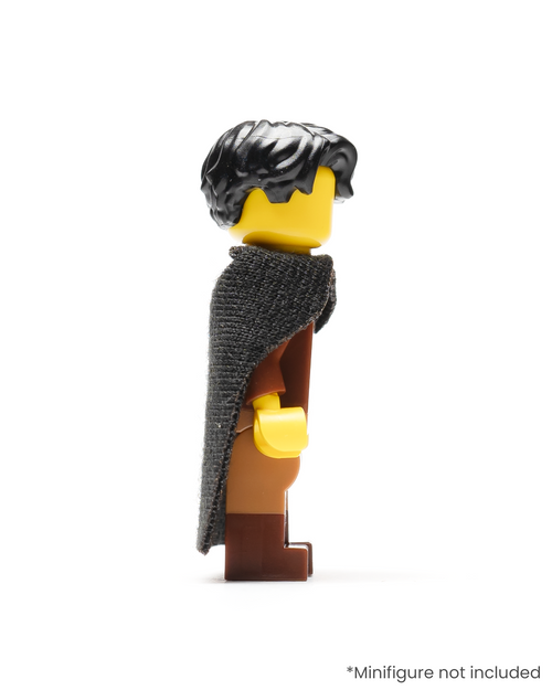 Profile of a LEGO minifigure wearing a black cloak