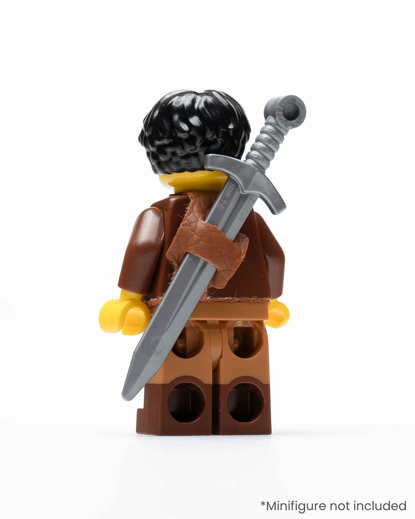 A rear view of a LEGO minifigure wearing a sword in a sheath on its back