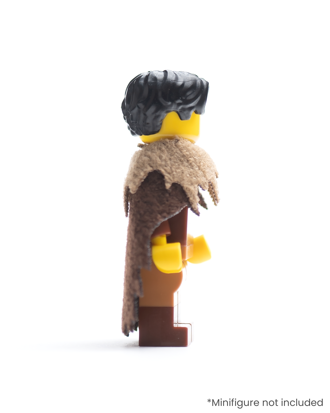 Side view of LEGO minifigure with a tattered cloak and fur collar on a white background