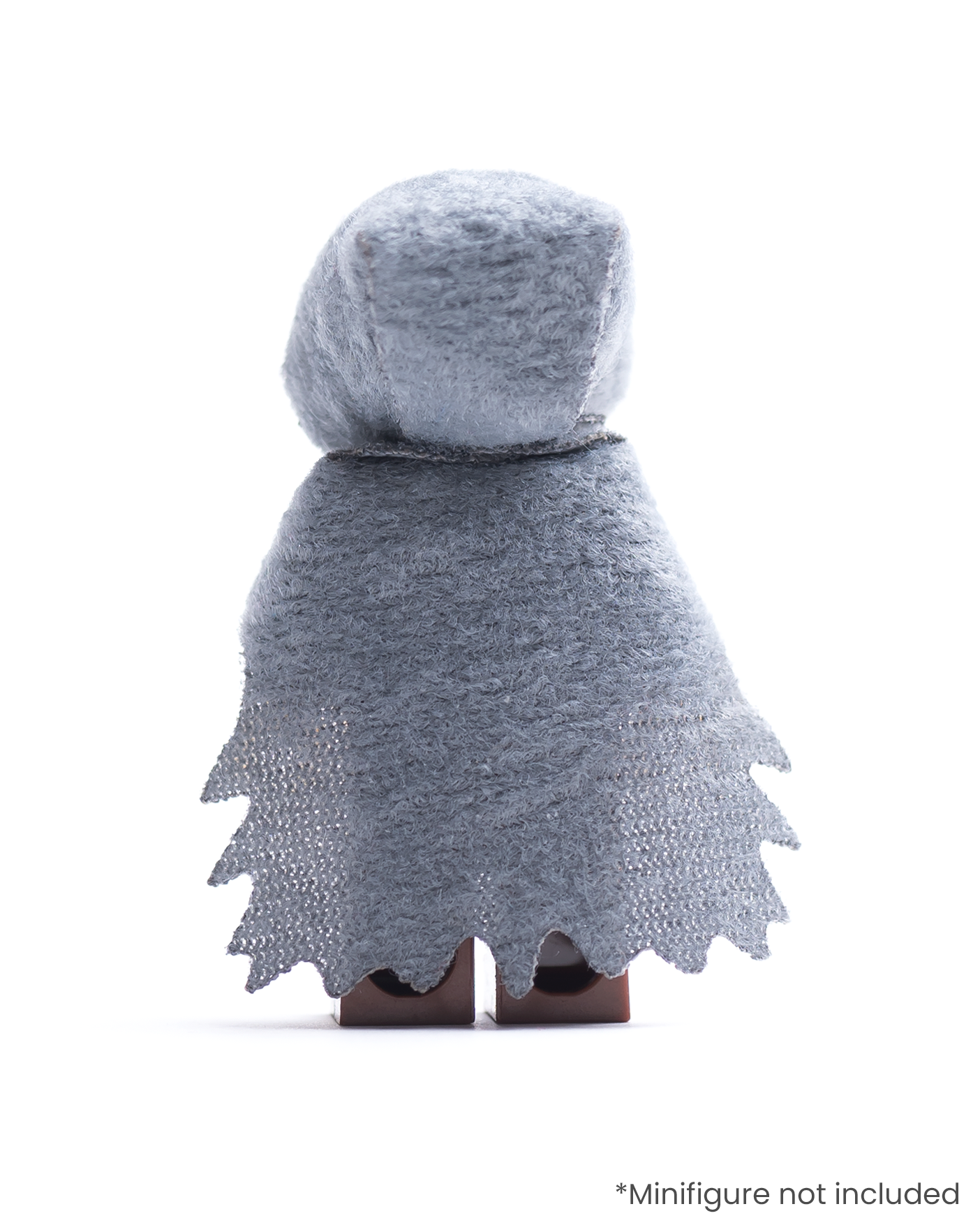 Rear view of LEGO minifigure wearing a dark gray hood and tattered cape on a white background