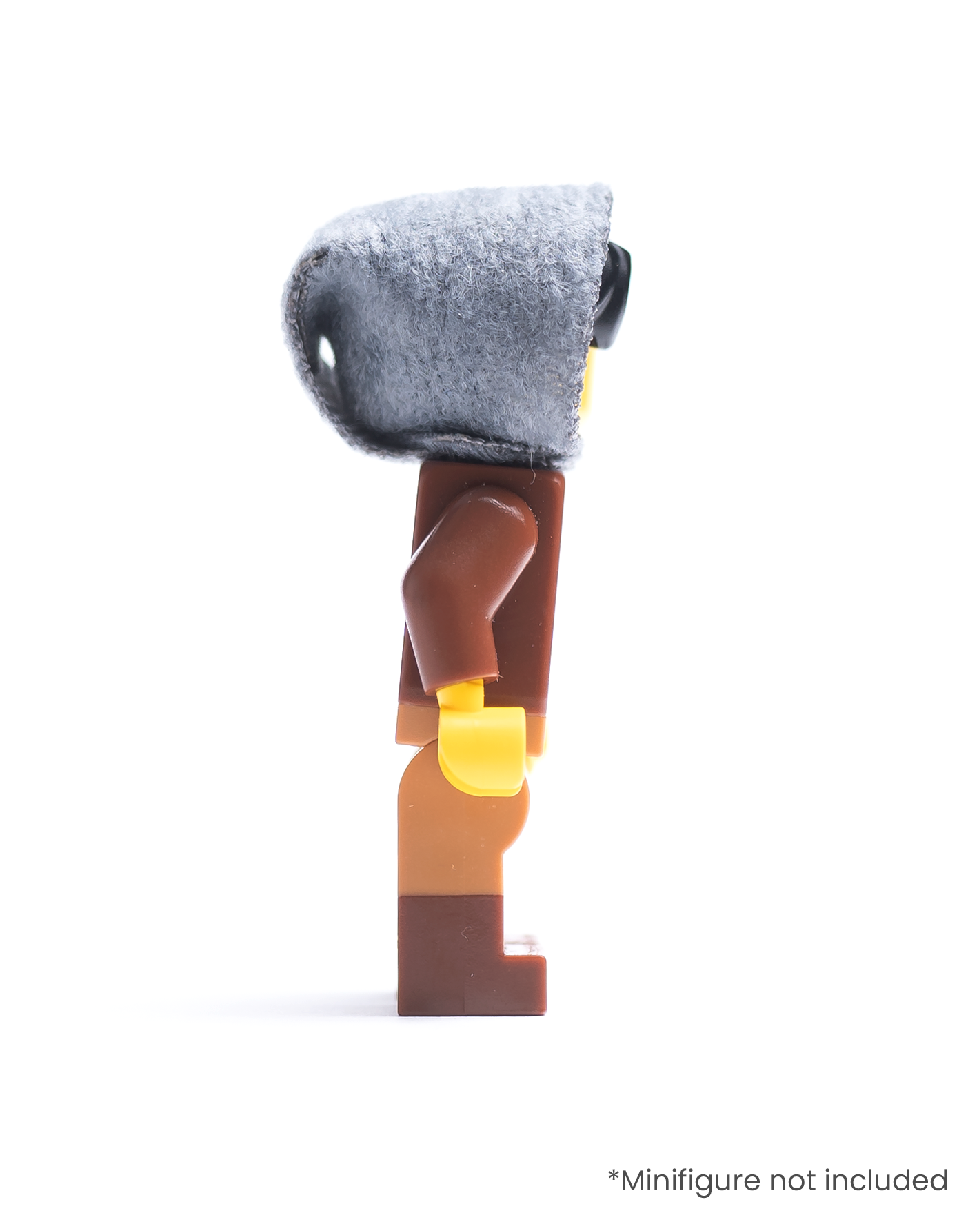 Side view of LEGO minifigure wearing a dark gray hood on a white background