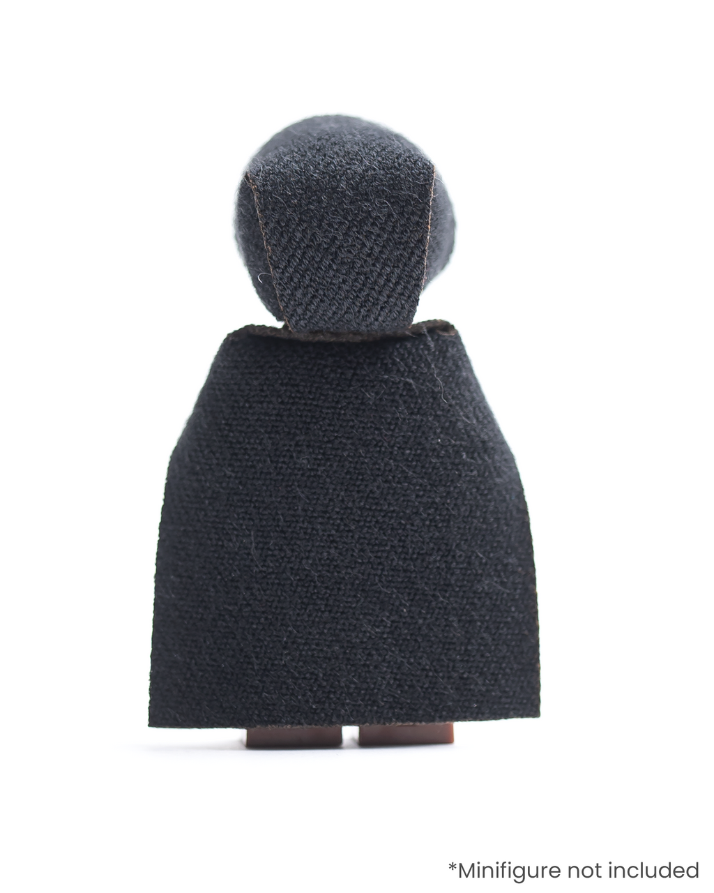 Rear view of LEGO minifigure wearing a black hood and cloak on a white background