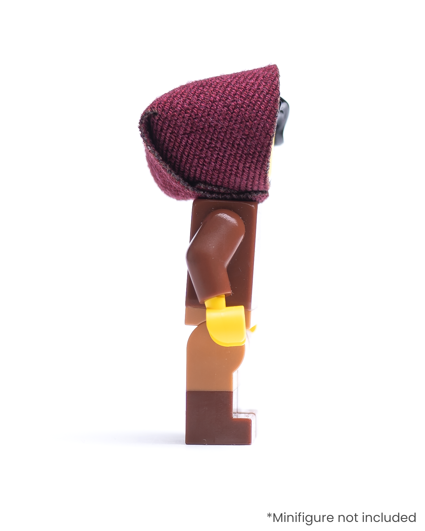 Side view of LEGO minifigure wearing a dark red hood on a white background