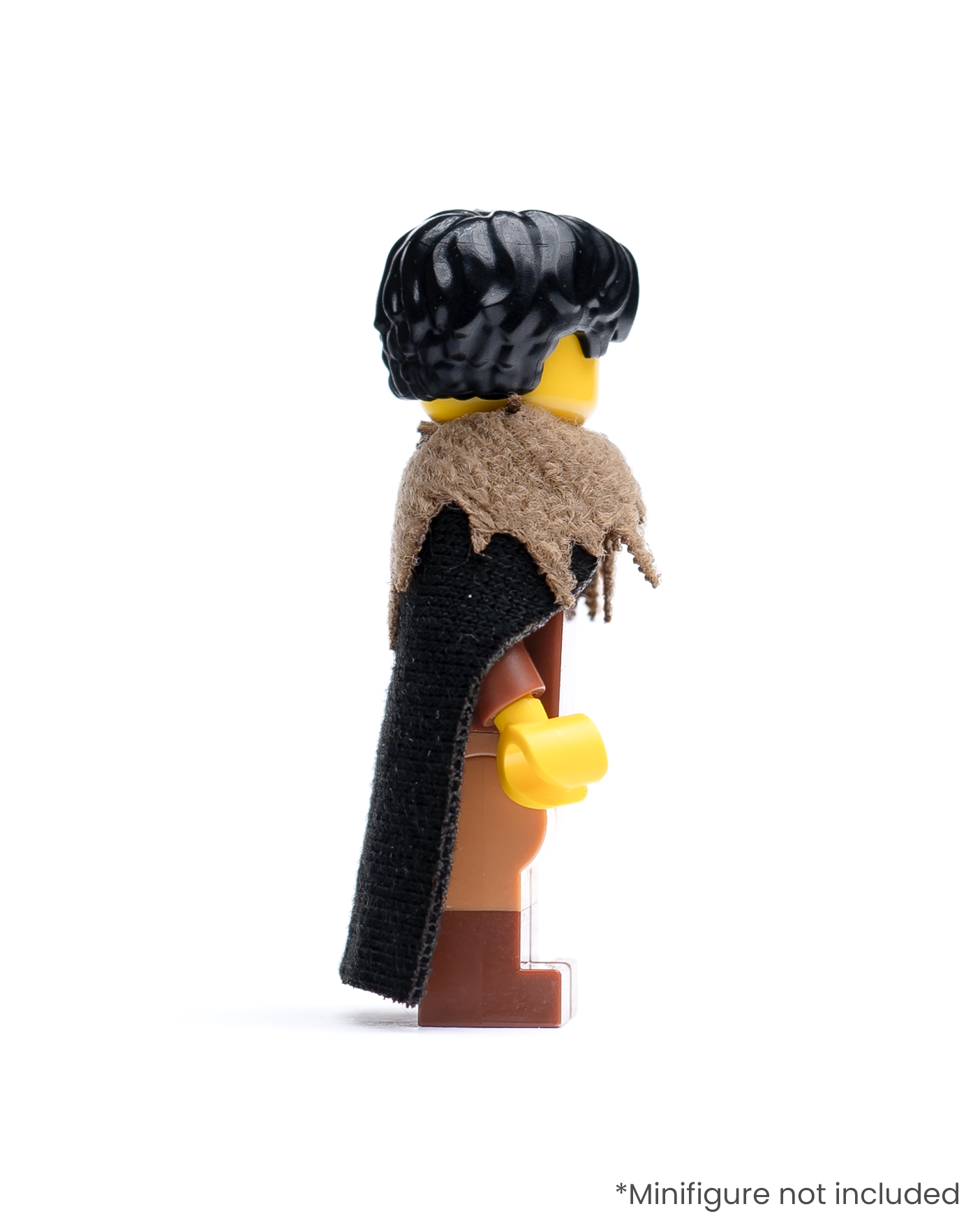 Side view of LEGO minifigure with a black cloak and fur collar on a white background