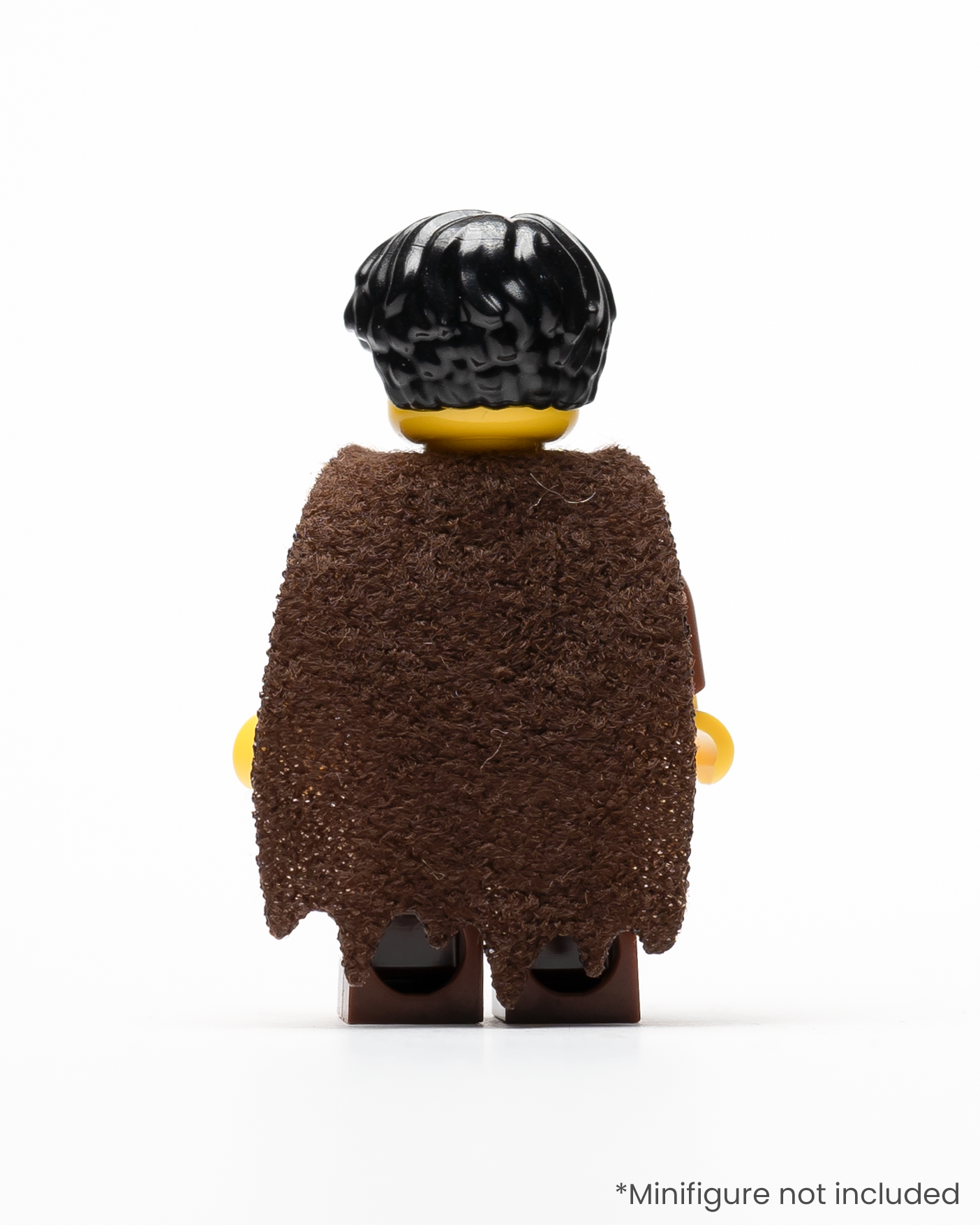 A rear view of a LEGO minifigure wearing a tattered cape