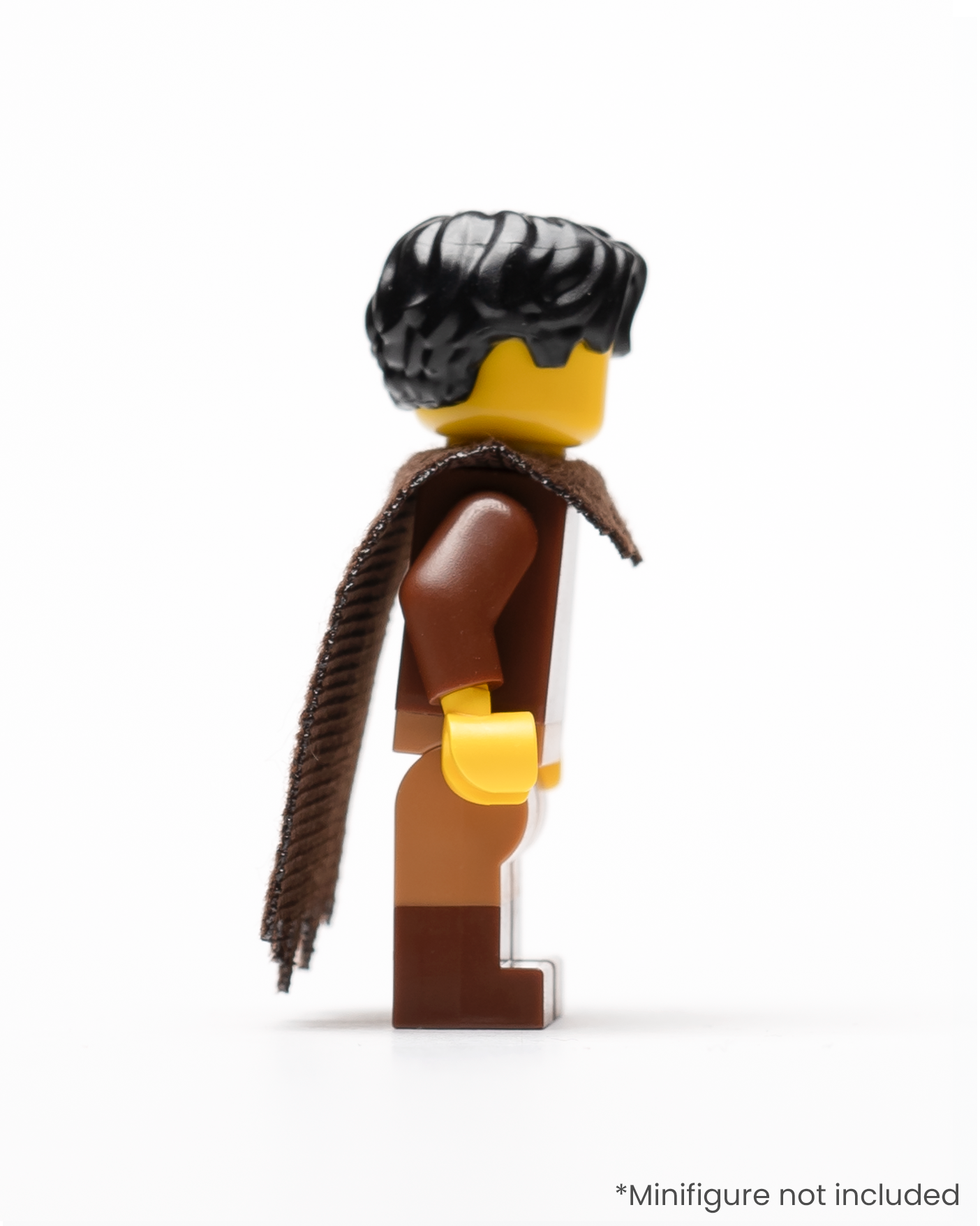 Profile of a LEGO minifigure wearing a tattered cape