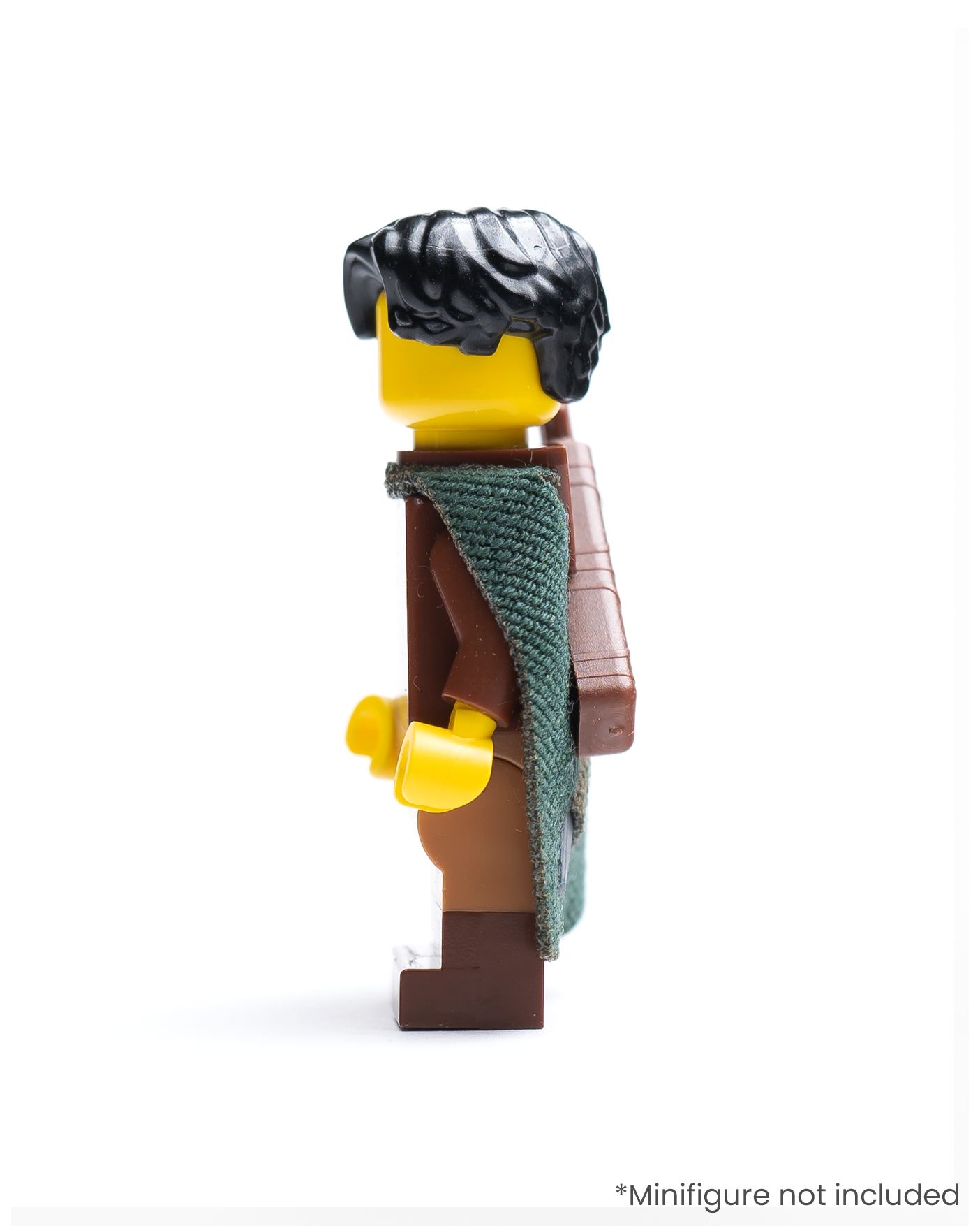 Side view of LEGO minifigure wearing a dark green cape with a brown quiver and sword on its back against a white background